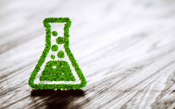 green-chemistry-industry-sign-on-black-wooden-background